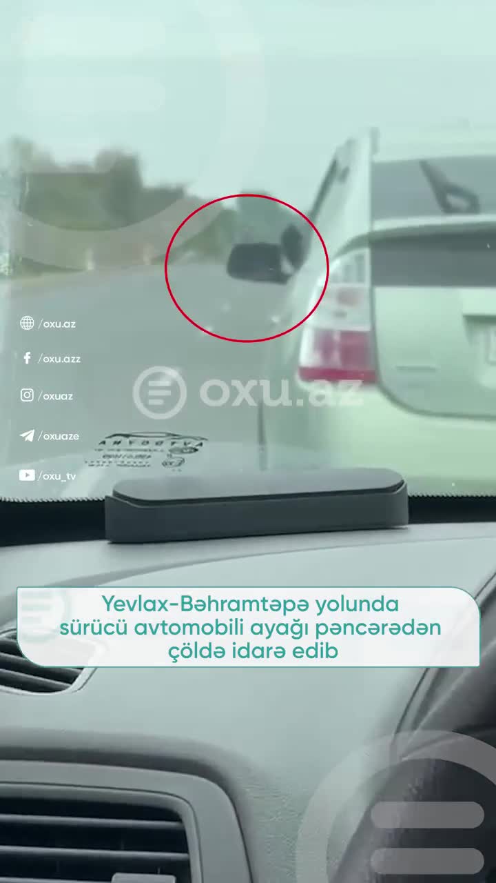 Ayağını pəncərədən çıxaran sürücü təhlükə yaratdı 