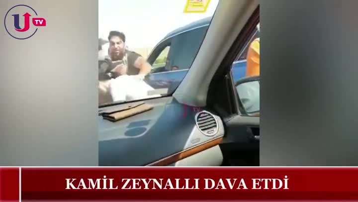 Kamil Zeynallı polisin gözü qarşısında yumruq davasına çıxdı