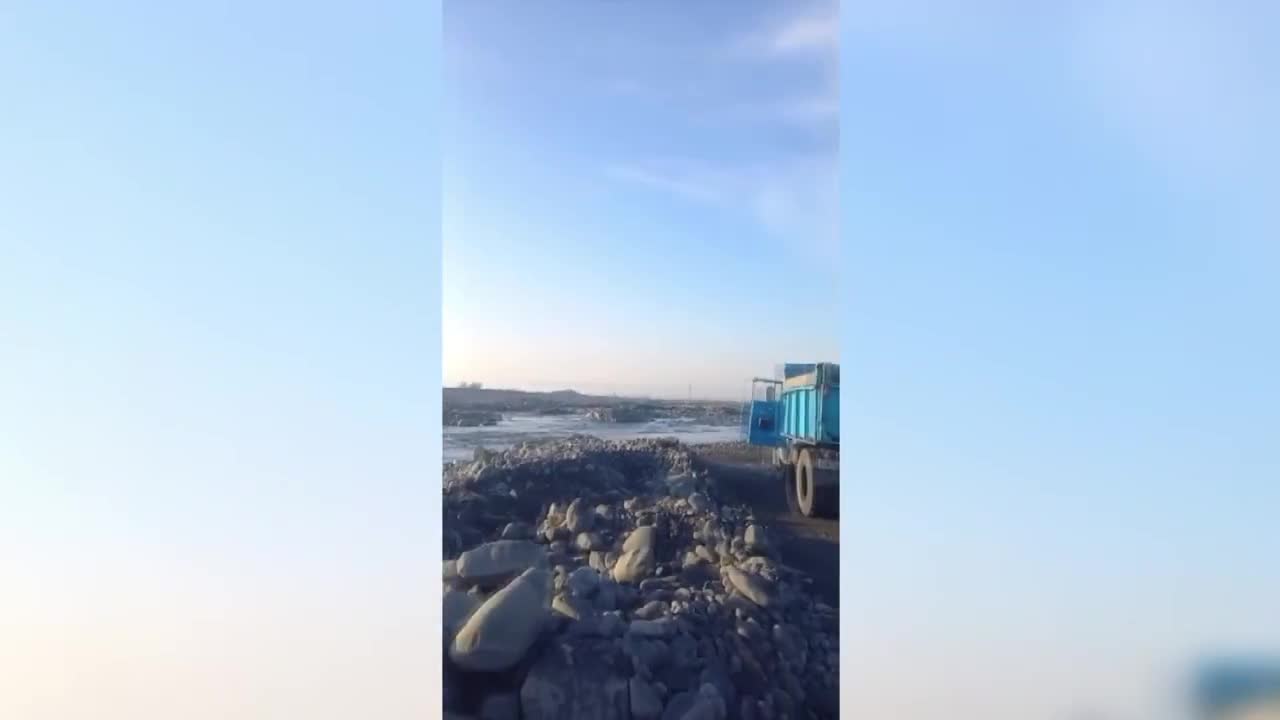 Qum çınqıl daşıyanlar